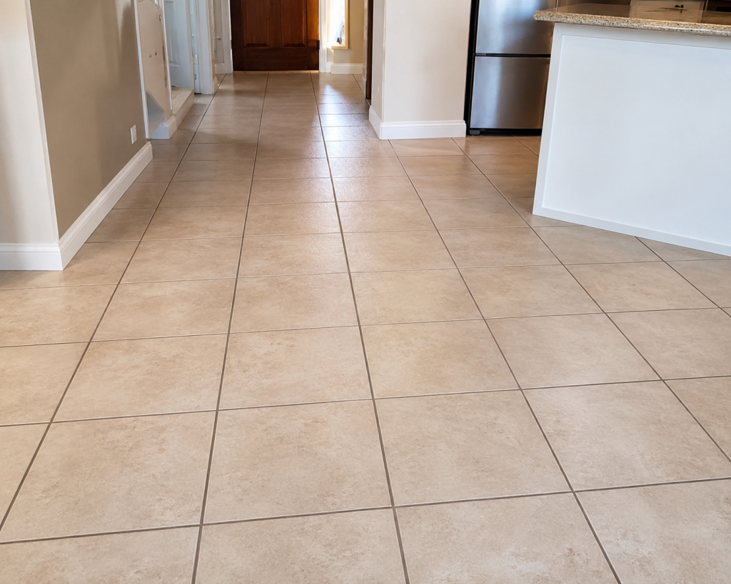 Freshly restored tile floor with professionally applied grout color sealer