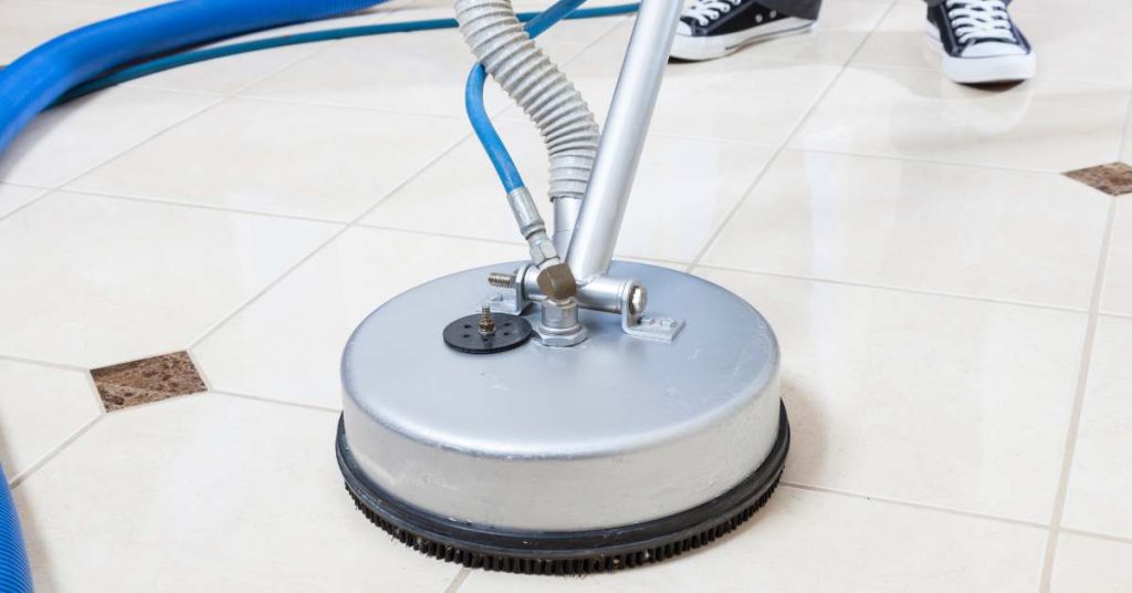 Professional tile and grout cleaning in progress