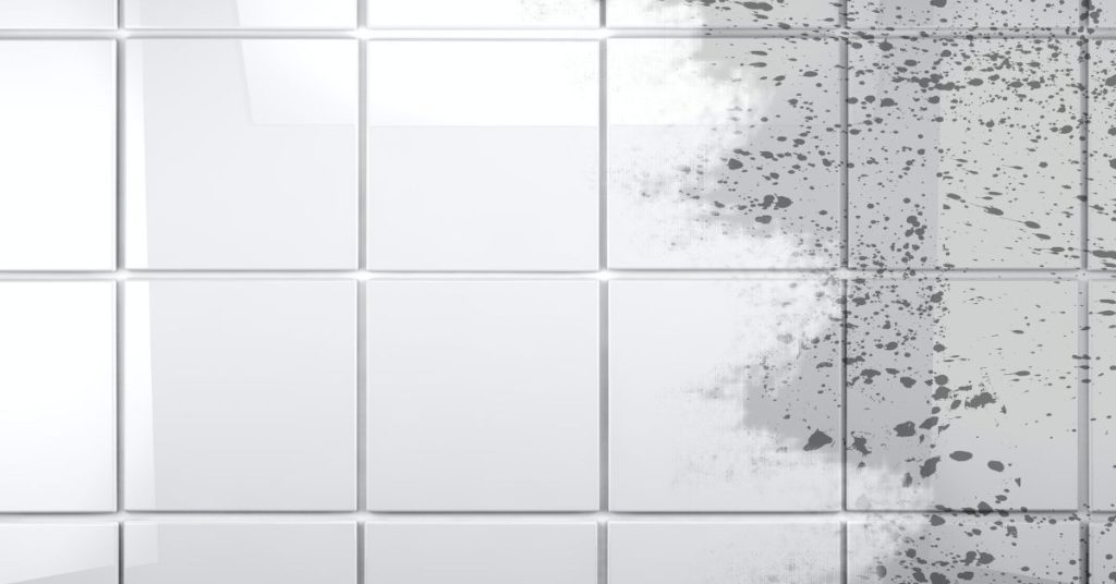 Close-up of stained grout lines on tile floor