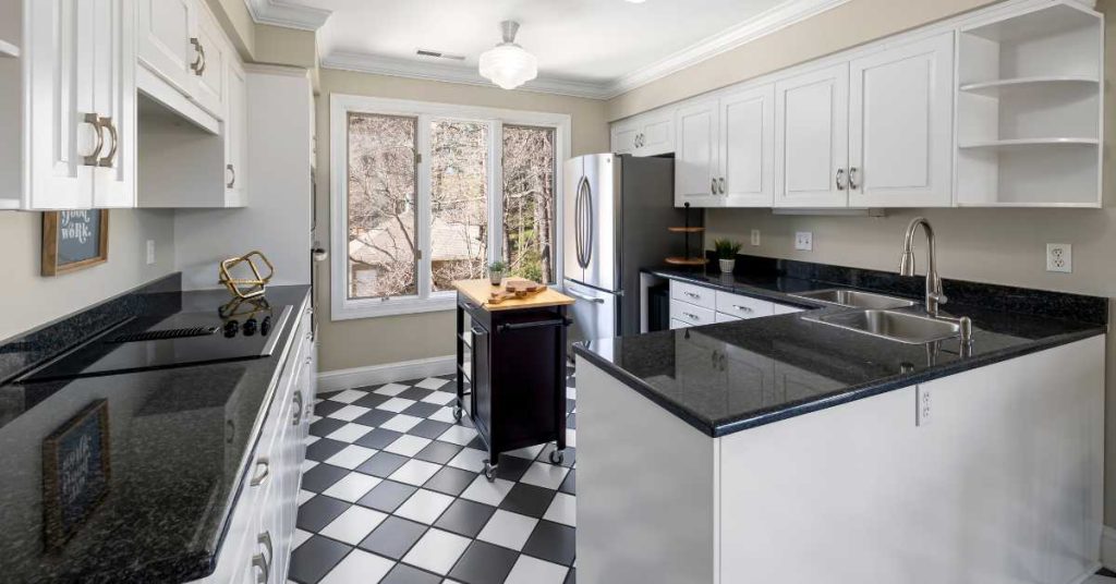 restored kitchen tile floor with freshly sealed grout